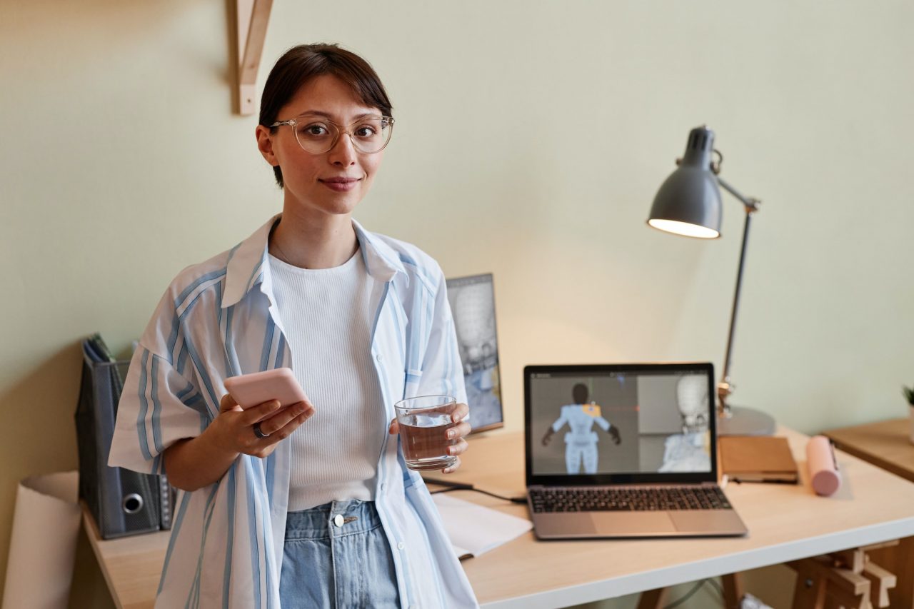 young-woman-as-3d-designer-at-home-office-workplace.jpg